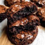 { "title": "Fudgy Chewy Browkies", "type": "food", "name": "Fudgy Chewy Browkies", "summary": "These fudgy and chewy browkies are the ultimate cross between brownies and cookies — rich, chocolatey, with a crackly top and soft, gooey centers.", "notes": "Use room-temperature eggs for better volume when whipping. For extra fudginess, slightly underbake and allow the brookies to set as they cool. Demerara sugar gives a slight crunch; if unavailable, substitute with light brown sugar.", "image_url": "https://yourdomaine.com/wp-content/uploads/2025/08/fudgy-chewy-browkies.webp", "pin_image_url": "", "pin_image_repin_id": "", "post_author": "1", "author_display": "post_author", "author_name": "", "author_link": "", "cost": "5", "servings": "16", "servings_unit": "brookies", "servings_advanced_enabled": "", "prep_time": "15", "prep_time_zero": "0", "cook_time": "14", "cook_time_zero": "0", "total_time": "29", "custom_time": "", "custom_time_zero": "0", "custom_time_label": "", "servings_advanced": { "shape": "round", "unit": "inch", "diameter": 0, "width": 0, "length": 0, "height": 0 }, "tags": { "course": ["Dessert"], "cuisine": ["American"], "keyword": ["brookies", "fudgy cookies", "chewy brownie cookies", "chocolate dessert"] }, "ingredients_flat": [ { "amount": "95", "unit": "g", "name": "all-purpose flour (¾ cup)" }, { "amount": "2", "unit": "tbsp", "name": "cocoa powder" }, { "amount": "1", "unit": "tsp", "name": "baking powder" }, { "amount": "0.25", "unit": "tsp", "name": "salt" }, { "amount": "225", "unit": "g", "name": "dark chocolate, chopped (1¼ cups)" }, { "amount": "56", "unit": "g", "name": "butter, salted or unsalted (¼ cup)" }, { "amount": "2", "unit": "large", "name": "eggs, room temperature" }, { "amount": "100", "unit": "g", "name": "caster sugar or granulated sugar (¾ cup)" }, { "amount": "90", "unit": "g", "name": "demerara sugar or raw sugar (½ cup)" }, { "amount": "1", "unit": "tsp", "name": "vanilla extract" }, { "amount": "85", "unit": "g", "name": "dark or milk chocolate chips (½ cup)" } ], "instructions_flat": [ { "text": "Preheat to 160ºC (320ºF) fan or 170ºC (338ºF) conventional. Line a baking tray with parchment paper.", "type": "instruction", "name": "Step 1", "summary": "Preheat oven and line tray.", "image_url": "" }, { "text": "Melt chopped chocolate and butter in a heatproof bowl over simmering water. Stir until smooth, then mix in vanilla extract.", "type": "instruction", "name": "Step 2", "summary": "Melt chocolate and butter, add vanilla.", "image_url": "" }, { "text": "In a separate bowl, whisk eggs, caster sugar, and demerara sugar on high speed for about 5 minutes until thick and fluffy.", "type": "instruction", "name": "Step 3", "summary": "Whip eggs and sugars until fluffy.", "image_url": "" }, { "text": "Sift together flour, cocoa powder, baking powder, and salt. Stir in chocolate chips.", "type": "instruction", "name": "Step 4", "summary": "Mix dry ingredients with chocolate chips.", "image_url": "" }, { "text": "Fold the melted chocolate mixture into the whipped eggs gently.", "type": "instruction", "name": "Step 5", "summary": "Combine melted chocolate with eggs.", "image_url": "" }, { "text": "Add the dry ingredients to the wet mixture, folding carefully until just combined.", "type": "instruction", "name": "Step 6", "summary": "Fold in dry ingredients.", "image_url": "" }, { "text": "Scoop tablespoons of batter onto the tray, spacing evenly. Bake for 12–14 minutes until tops are shiny and crackly.", "type": "instruction", "name": "Step 7", "summary": "Bake until shiny and crackly.", "image_url": "" }, { "text": "Sprinkle with sea salt if desired. Let cool 10 minutes before transferring to a wire rack.", "type": "instruction", "name": "Step 8", "summary": "Cool and finish with sea salt.", "image_url": "" } ], "equipment": [ { "name": "Mixing bowls (heatproof, medium, and large)", "notes": "" }, { "name": "Whisk and spatula", "notes": "" }, { "name": "Electric hand whisk or stand mixer", "notes": "" }, { "name": "Baking tray lined with parchment paper", "notes": "" }, { "name": "Measuring cups and spoons", "notes": "" }, { "name": "Wire cooling rack", "notes": "" } ], "nutrition": { "calories": "150", "carbohydrates": "20", "protein": "2", "fat": "8", "saturated_fat": "5", "polyunsaturated_fat": "0.5", "monounsaturated_fat": "2", "trans_fat": "0", "cholesterol": "25", "sodium": "60", "potassium": "120", "fiber": "1", "sugar": "14", "vitamin_a": "150", "vitamin_c": "0", "calcium": "15", "iron": "1.5" }, "custom_fields": { "inspiration": "A rich, chocolatey treat that combines the best of brownies and cookies in one bite." }, "taxonomy_payload": { "terms": { "course": ["Dessert"], "cuisine": ["American"], "keyword": ["brookies", "fudgy cookies", "chewy brownie cookies", "chocolate dessert"] }, "meta": { "wprm_equipment": ["A", "B", "C", "D", "E", "F"] } } } Fudgy Chewy Browkies